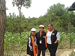 "Taking a break in a madre-guia's home in aldea Llano de La Virgen in San Raymundo with my fellow teammates Julia and Yahaira"