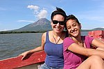 Blum Summer Scholars Ana Mascareñas and Jennifer Zelaya visit Isla Ometepe, an island formed by two volcanoes rising out of Lake Nicaragua. Active volcano, Concepción, featured in the background.